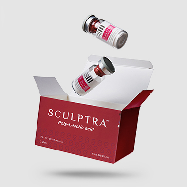 Open Sculptra box with two vials above located on a grey background highlighting the boxes branding